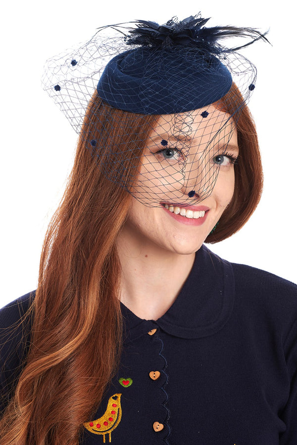 NOAM FEATHER AND FLOWER FASCINATOR