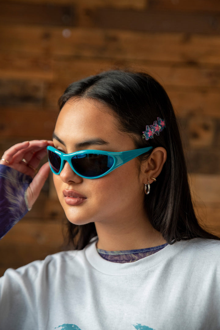 Y2k Sports Sunglasses in Turquoise with UV400 Protection by Dreambutdonotsleep