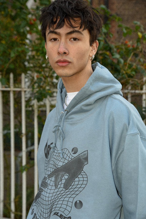 Hoodie in Dusty Blue with Sci Fi Rave Hands Print by Dreambutdonotsleep