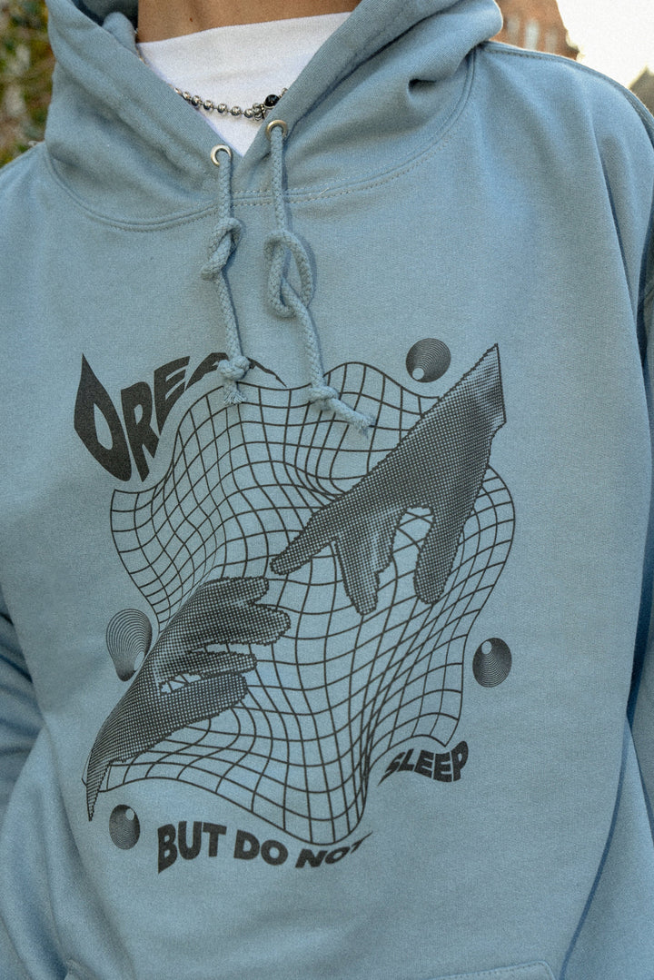 Hoodie in Dusty Blue with Sci Fi Rave Hands Print by Dreambutdonotsleep