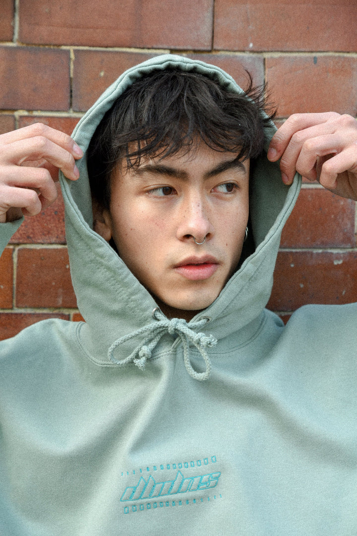 Hoodie in Dusty Green with Futuristic Logo Embroidery by Dreambutdonotsleep