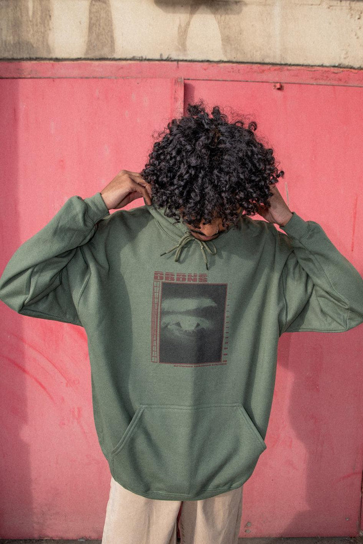 Military Green Hoodie With Spyware Print by Dreambutdonotsleep