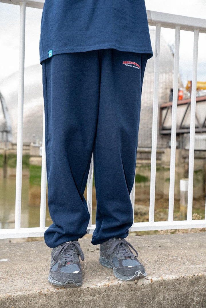 Joggers in Navy with Dream Sports Embroidery by Dreambutdonotsleep