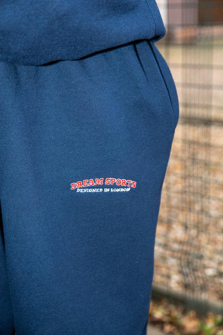 Joggers in Navy with Dream Sports Embroidery by Dreambutdonotsleep