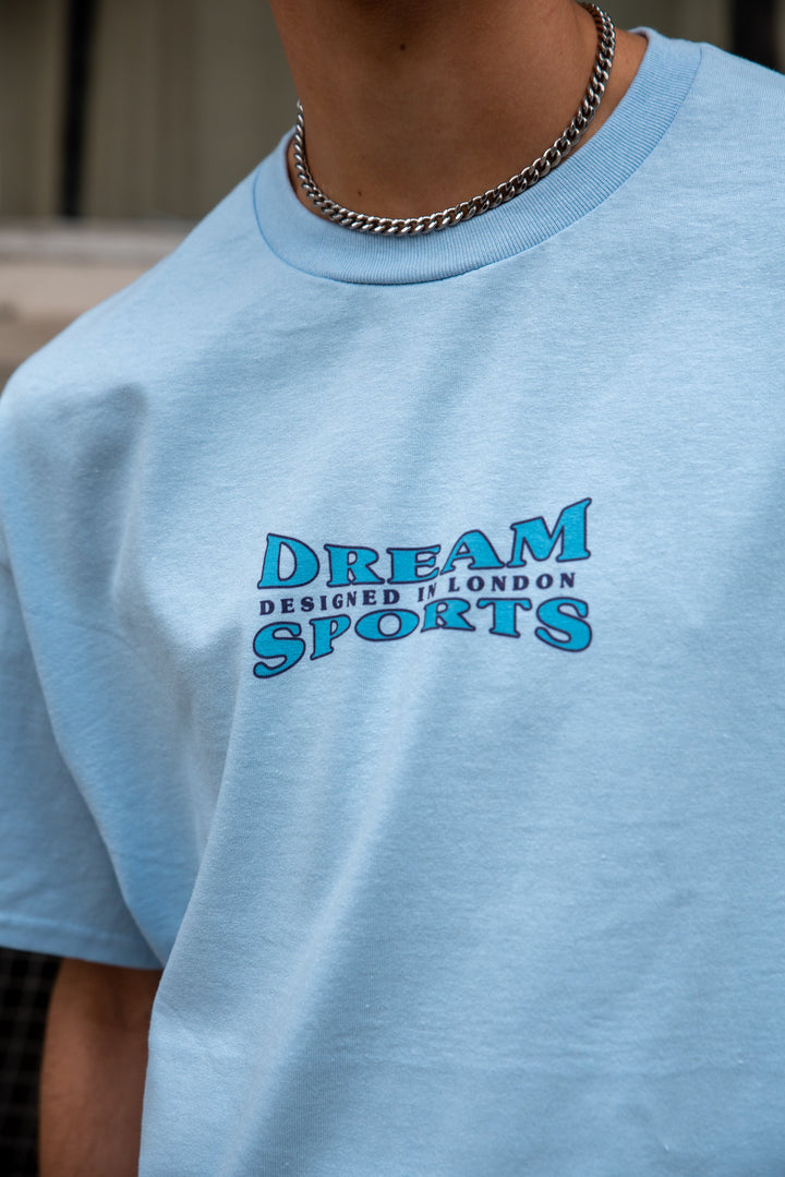 Short Sleeved T-shirt in Light Blue With Dream Sports Print by Dreambutdonotsleep