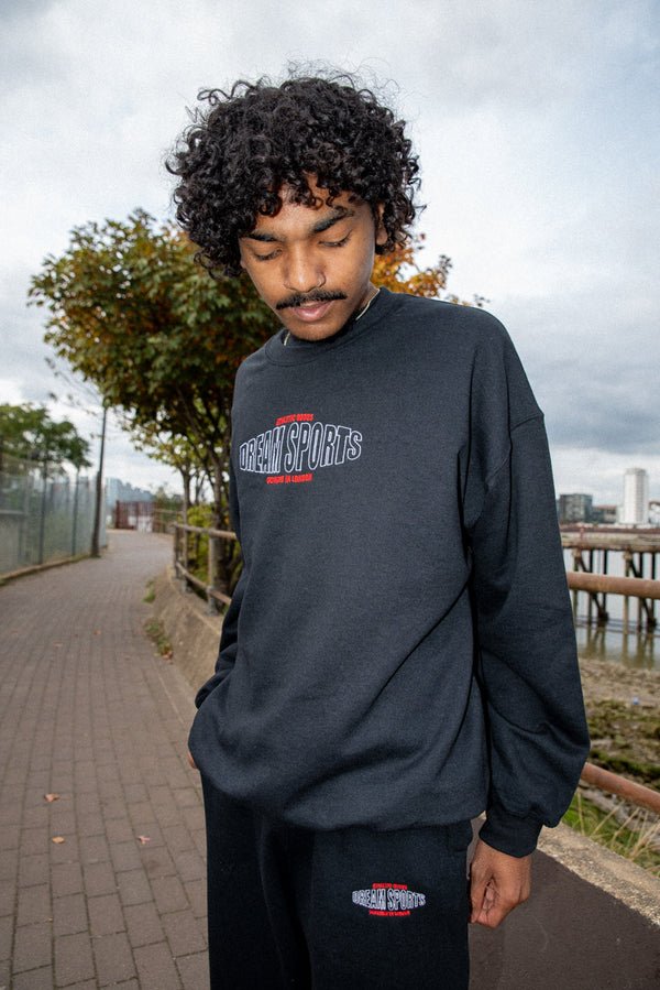 Sweatshirt in Black with Dream Sports Embroidery by Dreambutdonotsleep