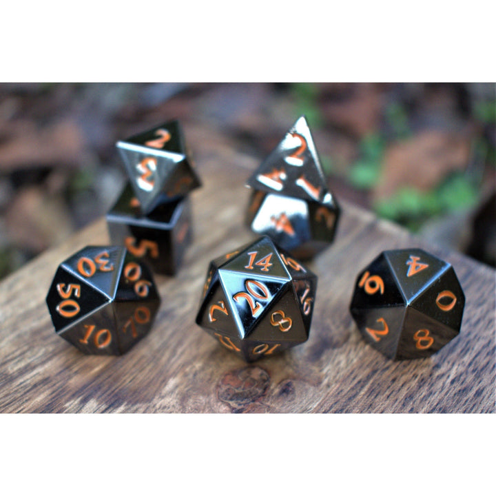 Black and Orange Sharp-Edged Metal Dice by Misty Mountain Gaming