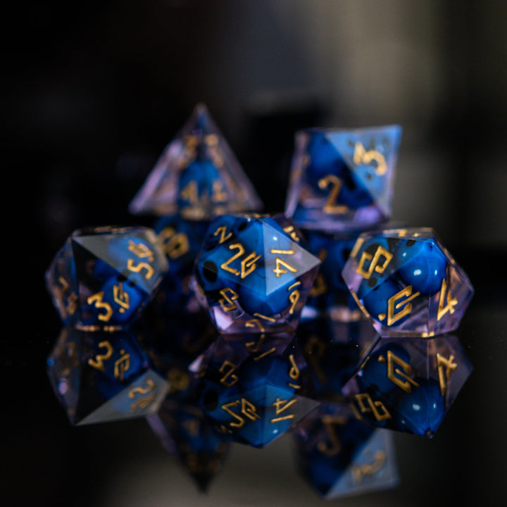 Corpse Blue and Lavender Sharp-Edged Resin Dice Set by Misty Mountain Gaming