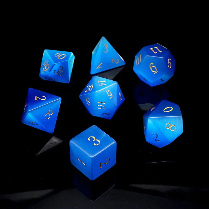 Gemstone: Blue Cat Eye Gold Numbers Dice Set by Haxtec