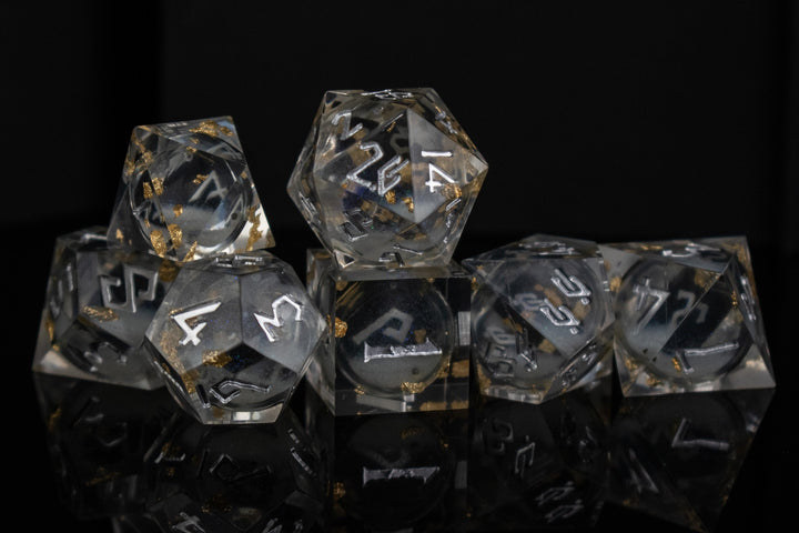 Golden Ashes Liquid Core Dice Set by Misty Mountain Gaming