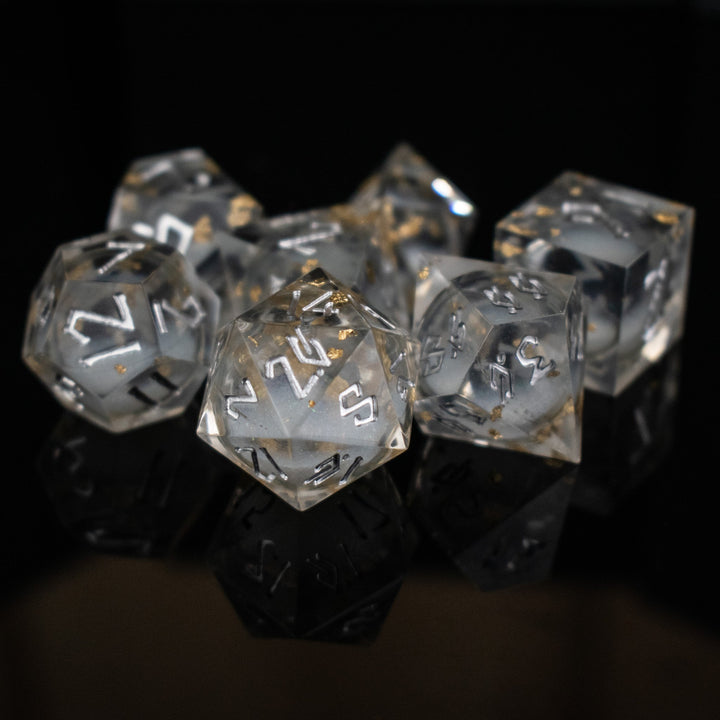 Golden Ashes Liquid Core Dice Set by Misty Mountain Gaming