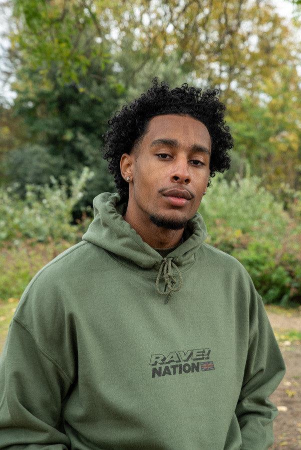 Hoodie in Military Green with 90s Rave Smiley Print by Dreambutdonotsleep