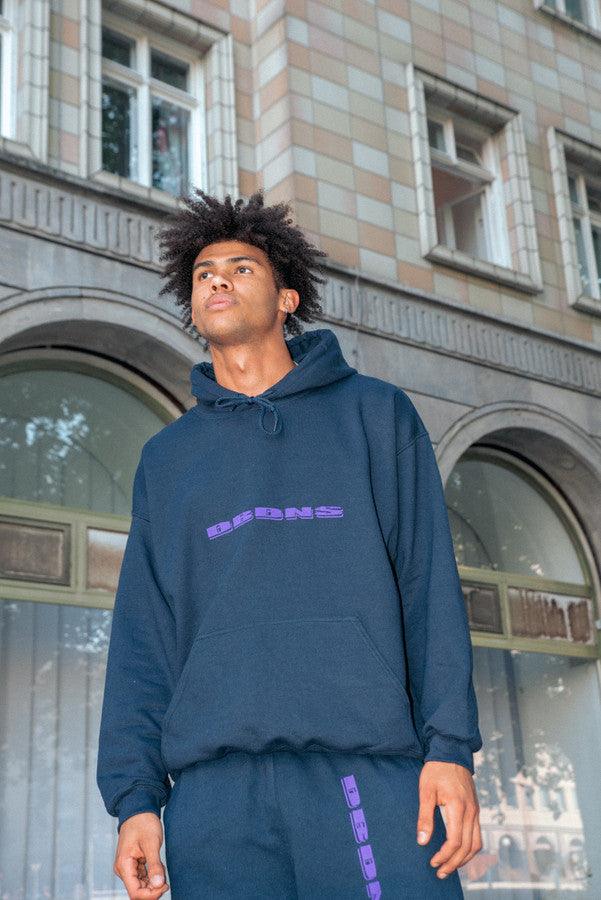 Hoodie in Navy with Purple Logo Embroidery by Dreambutdonotsleep