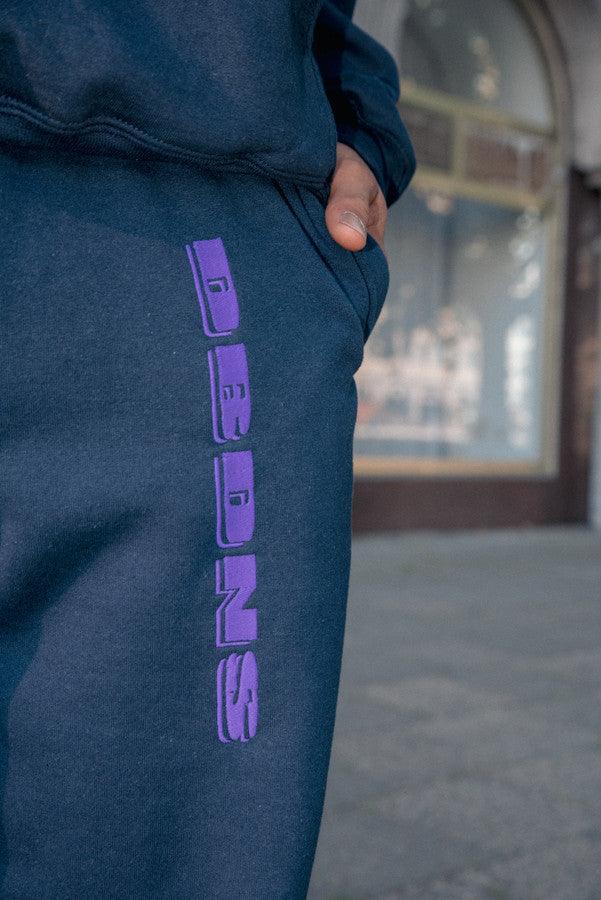 Joggers in Navy with Embroidered Logo Design by Dreambutdonotsleep