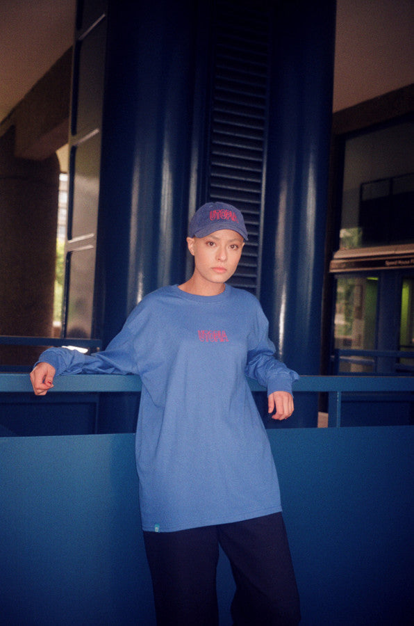 Royal Blue Long Sleeved T-shirt with Embroidered Utopia Logo by Dreambutdonotsleep