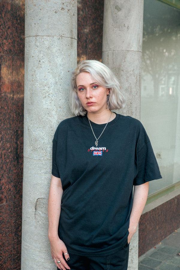 Black T-shirt With New Dream Sports Embroidered Logo by Dreambutdonotsleep