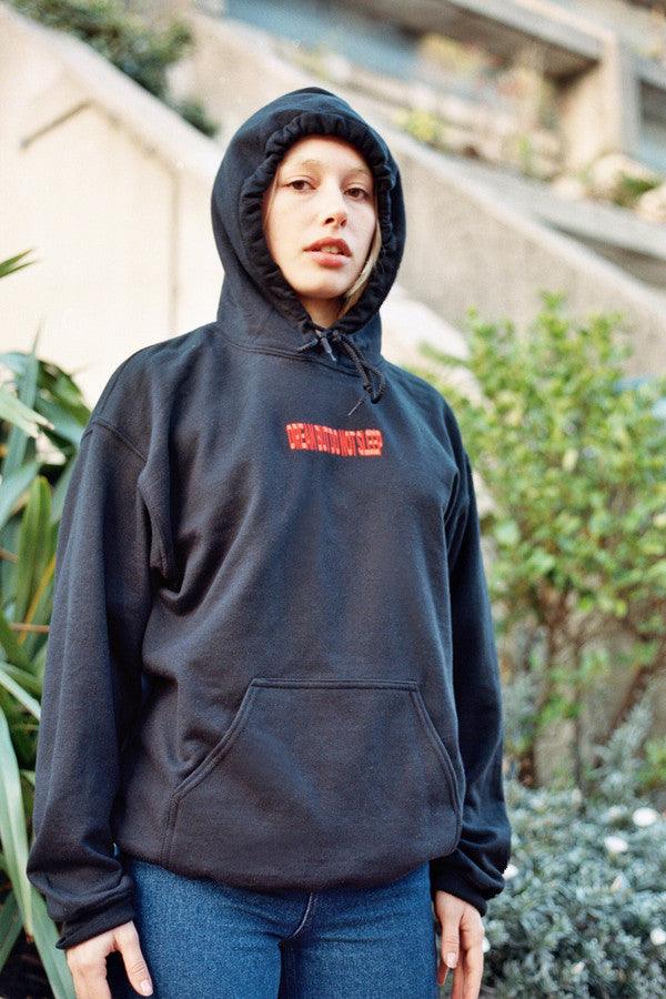 Black Hoodie With Embroidered DBDNS Logo by Dreambutdonotsleep