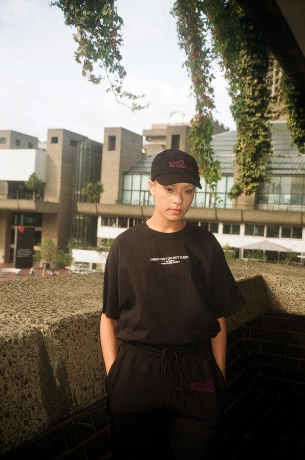 Black Short Sleeved T-shirt with Embroidered UK Born Logo by Dreambutdonotsleep