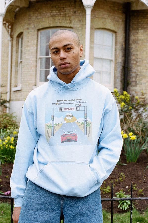 Hoodie In Light Blue With Drive In To The Sunset Print by Dreambutdonotsleep