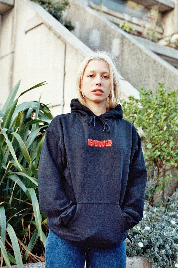 Black Hoodie With Embroidered DBDNS Logo by Dreambutdonotsleep