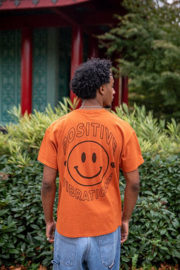 T-Shirt in Texas Orange With 90s Rave Smiley Positive Print-0