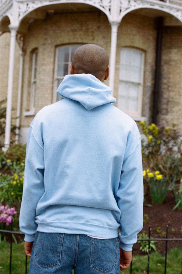 Hoodie In Light Blue With Drive In To The Sunset Print by Dreambutdonotsleep