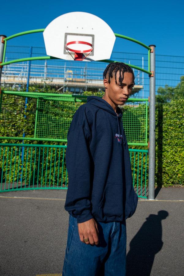 Hoodie in Navy with Dream Sports Logo Embroidery by Dreambutdonotsleep