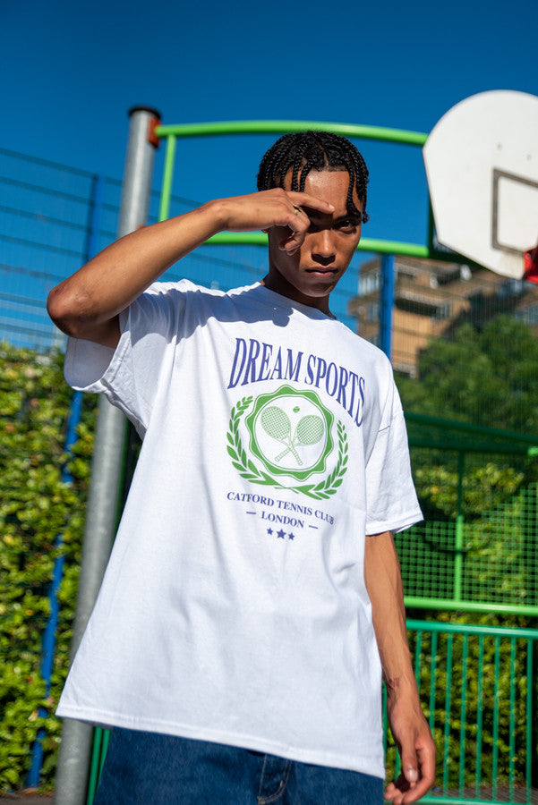 Short Sleeved T-Shirt in White Dream Sports Tennis Club Emblem Design by Dreambutdonotsleep