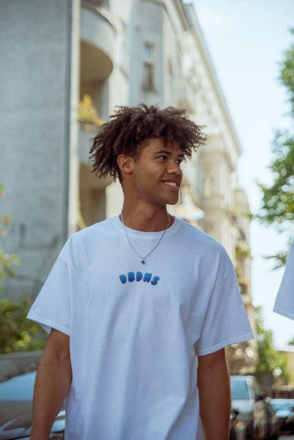 Tshirt in White with Blueberry Bubble Logo Print by Dreambutdonotsleep