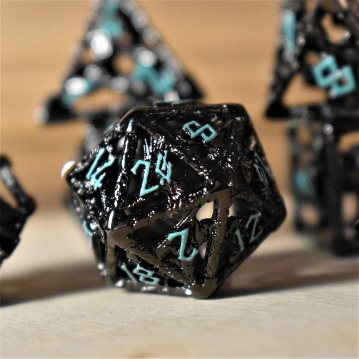 Legends of Valhalla - Black and Blue Hollow Metal Dice Set by Misty Mountain Gaming