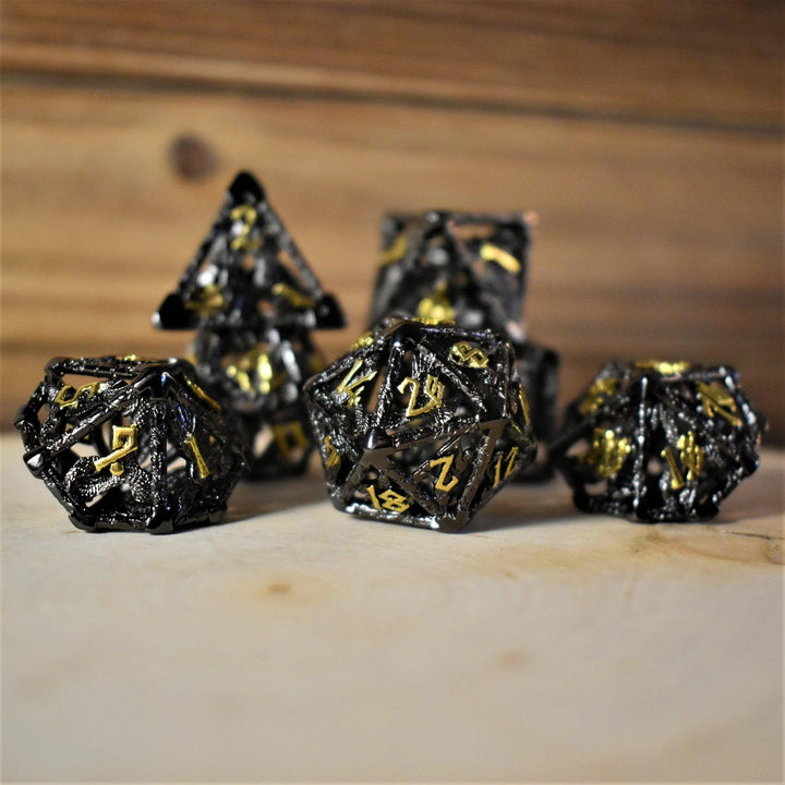 Legends of Valhalla - Black and Gold Hollow Metal Dice Set by Misty Mountain Gaming