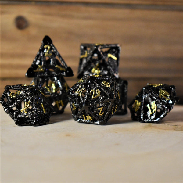 Legends of Valhalla - Black and Gold Hollow Metal Dice Set by Misty Mountain Gaming