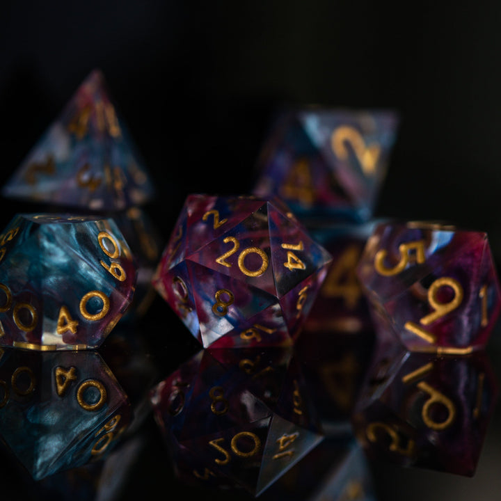 Plasma Gold Sharp-Edged Resin Dice Set by Misty Mountain Gaming