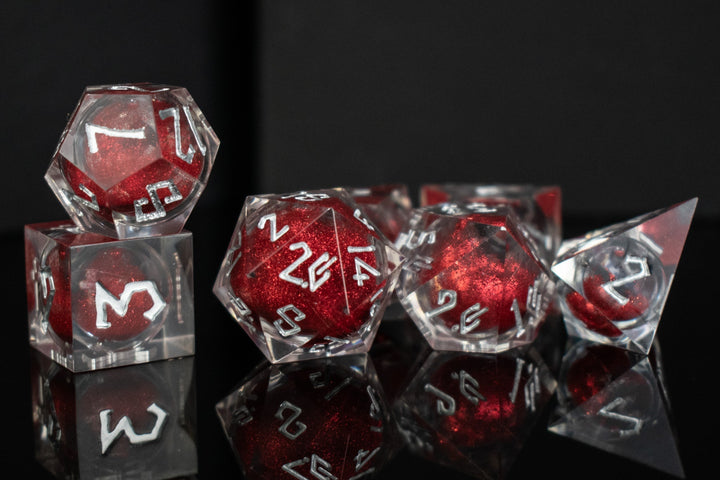 Ruby Slipper Liquid Core Dice Set by Misty Mountain Gaming