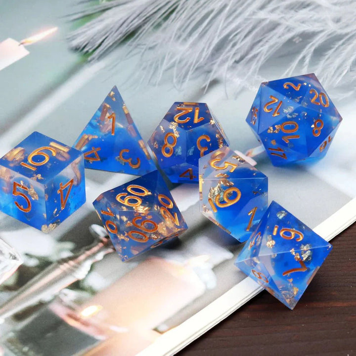 Sharp Edge: Blue Clear Gold Foil Dice Set by Haxtec