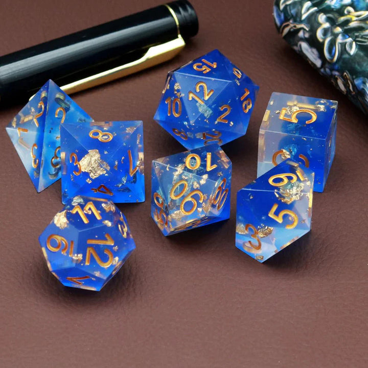 Sharp Edge: Blue Clear Gold Foil Dice Set by Haxtec