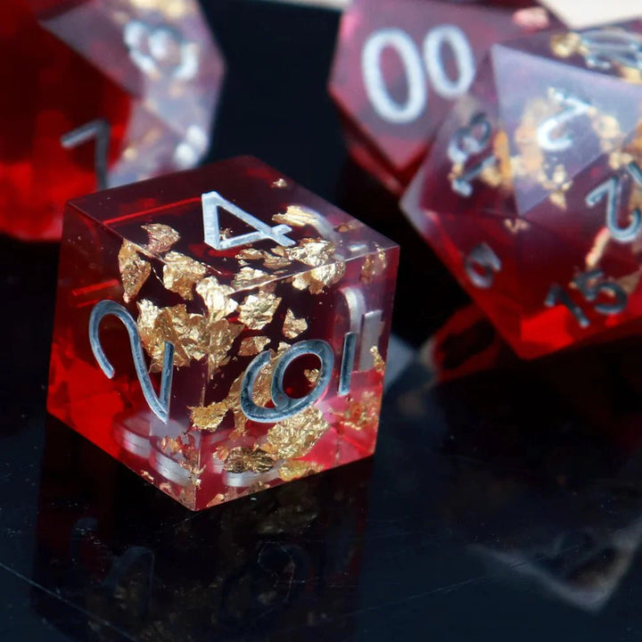 Sharp Edge: Red Clear Gold Foil Dice Set by Haxtec