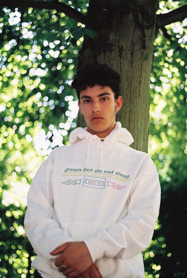 White Cotton Hoodie With Printed 80's VHS Design by Dreambutdonotsleep